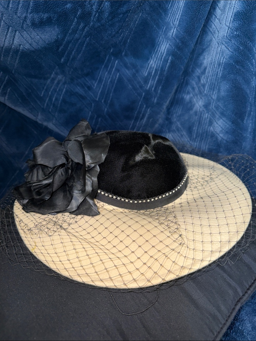 Classic Black and Cream Veiled Cocktail Hat with Floral Accent